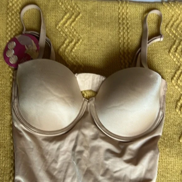 SPANX suit your fancy body suit.